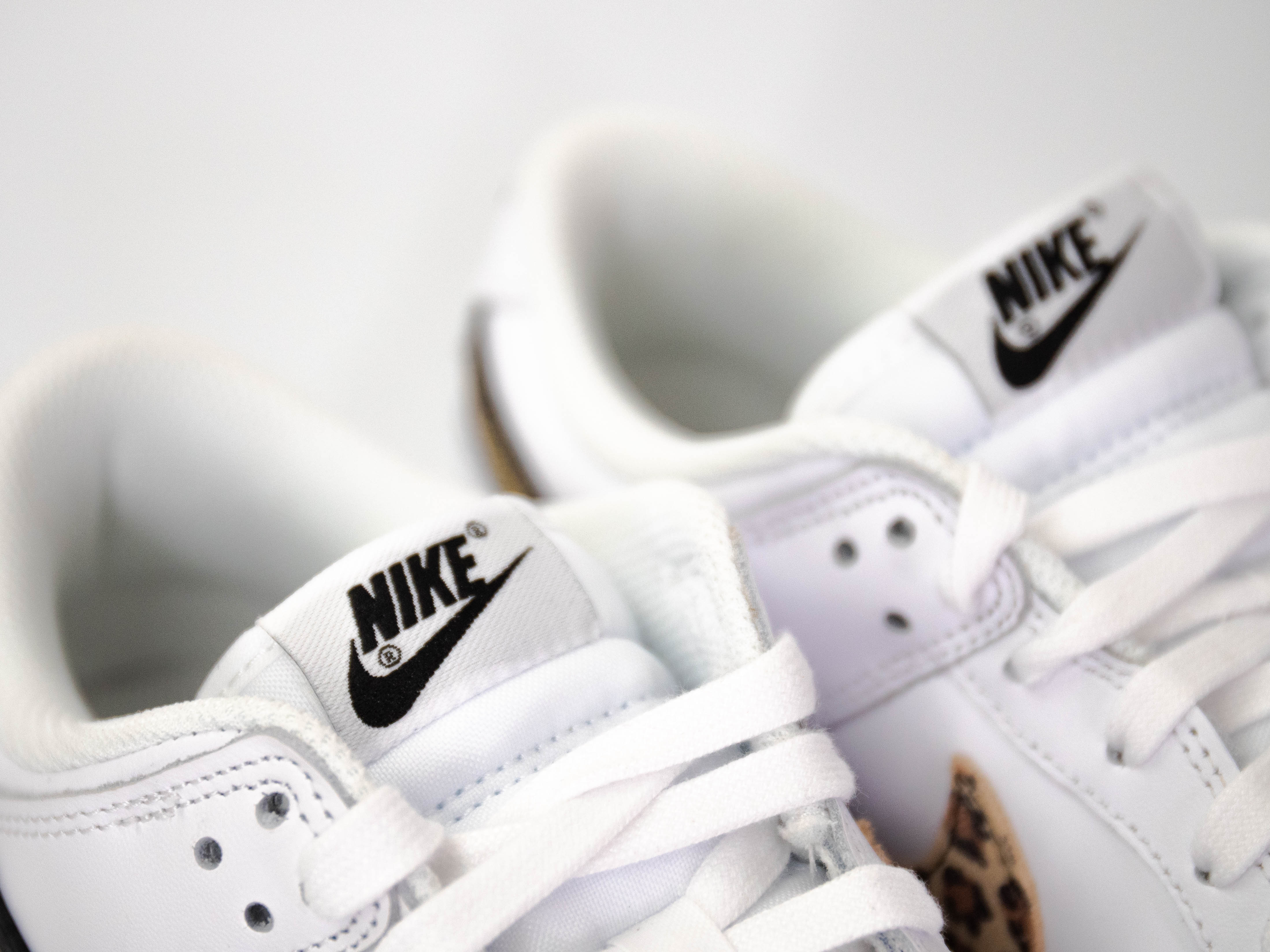 Leopard nikes clearance white